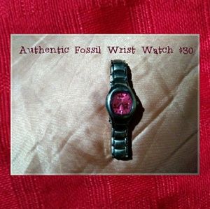 pink & silver Fossil wrist watch